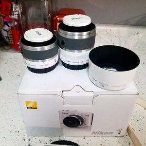 Nikon J1 camera with lenses